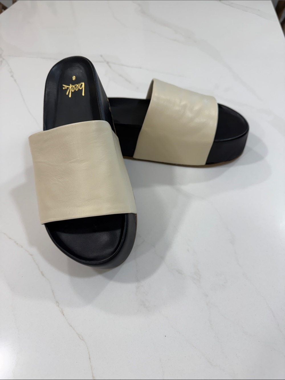 beek Two-Tone Wide Strap Slide Sandals in Cream and Black